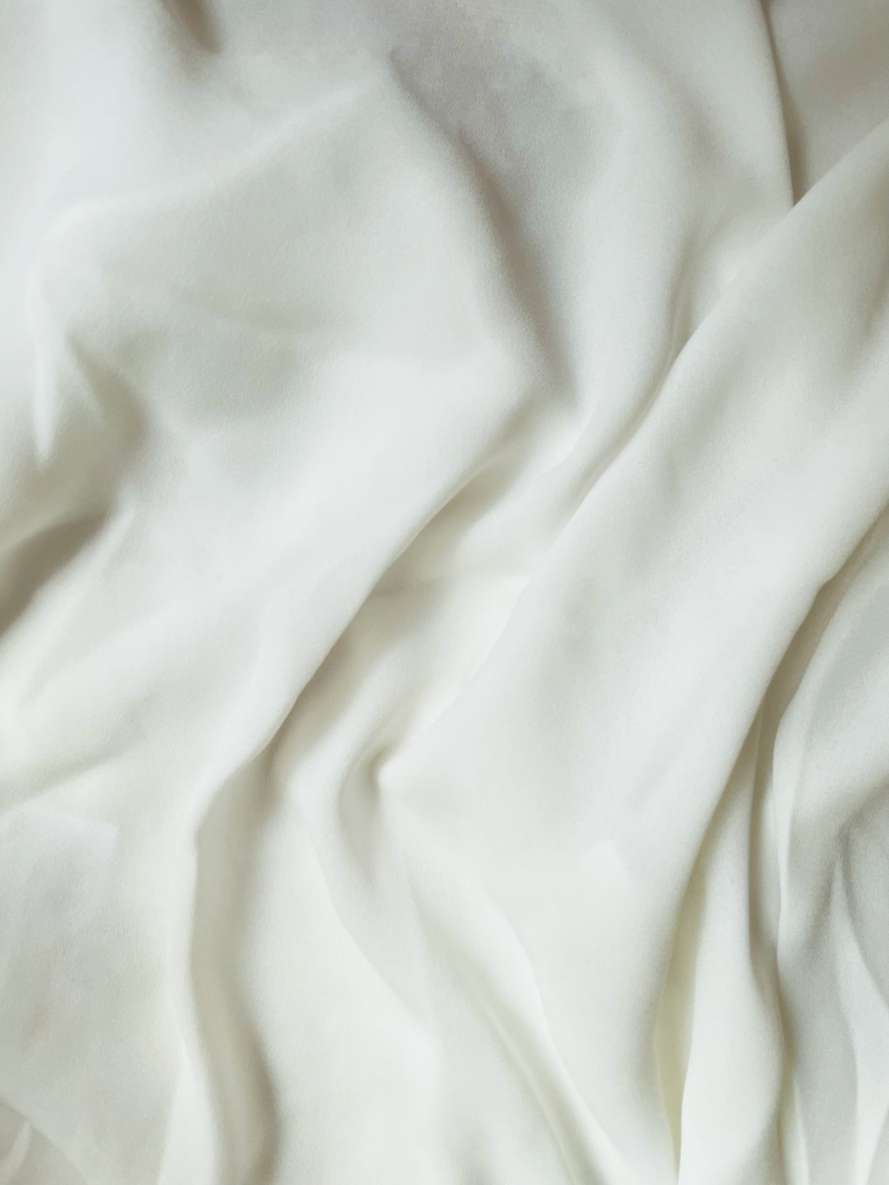 Close-up of soft white linen folds